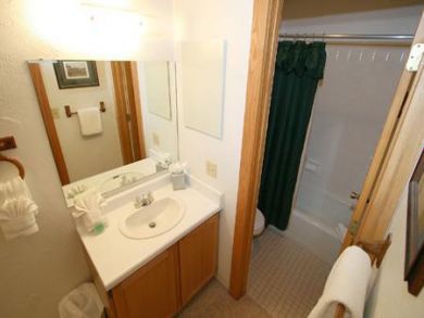 Bathroom with tub and shower