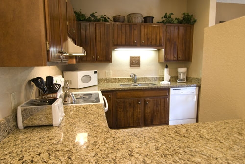 Fully equipped kitchen with granite counter tops