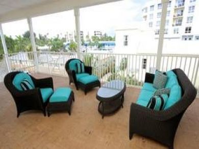 Balcony with comfortable outdoor furniture
