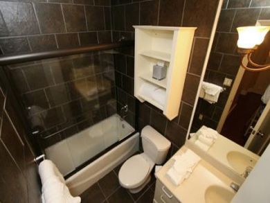 Bathroom with tub and shower