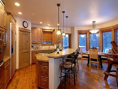 Gourmet kitchen with breakfast bar