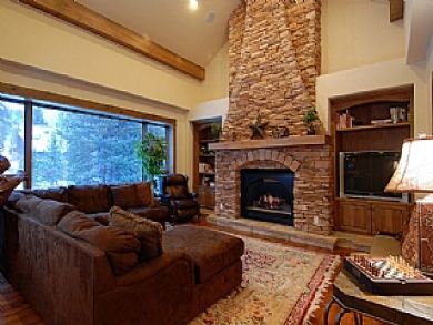 Living room with fireplace & flat screen TV