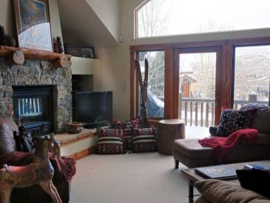 Mountain view from living room in Vail vacation home for skiing