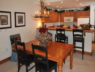 Dining area & breakfast bar Dining area & breakfast bar
