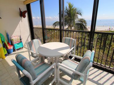 Screened Balcony with Table Set Screened Balcony with Table Set
