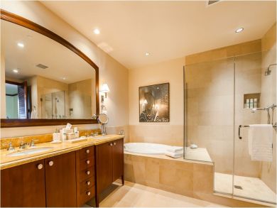Master Bathroom has Double Vanities, Tub & Walk-in Shower