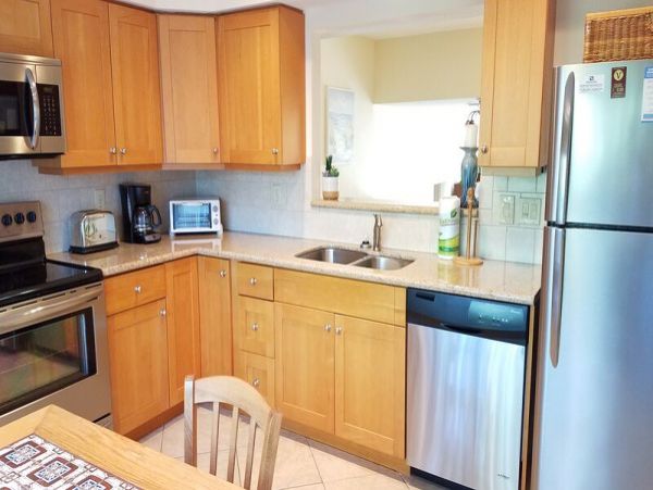Bi-Level Layout Vacation Condo Short Walk to Beach