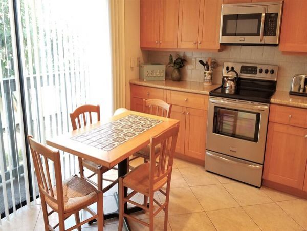 Bi-Level Layout Vacation Condo Short Walk to Beach