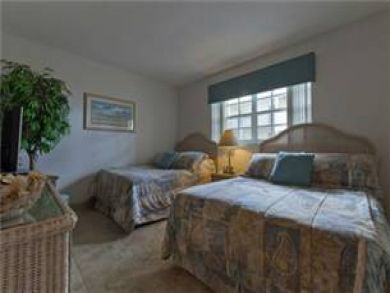 Guest bedroom with two double beds Guest bedroom with two double beds