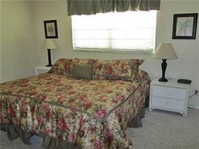 Master bedroom with king bed Master bedroom with king bed