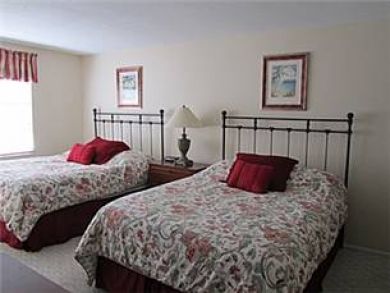 Guest bedroom with two queen beds Guest bedroom with two queen beds