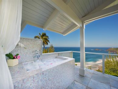 Balcony with outdoor tub & ocean view