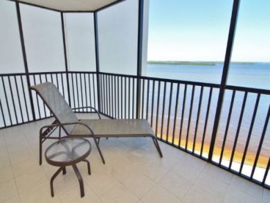 Lounger and Small Table on Balcony
