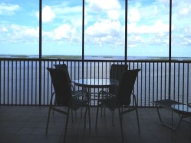 Gulf front balcony with table set
