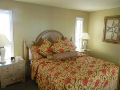 Master bedroom with king bed Master bedroom with king bed