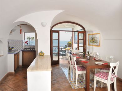 The kitchen & dining room are side by side
