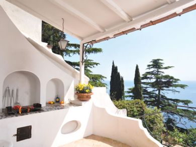 Covered terrace with barbecue