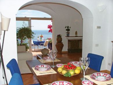 A classy modern Positano apartment sits above & well back the Amalfi Coast drive