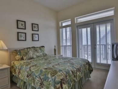Master bedroom with queen bed