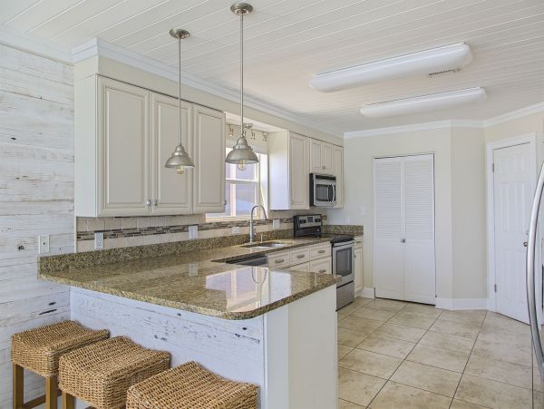 Luxury Four Bedroom Rental Sleeps 12 Beach side Home