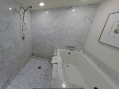 Bathroom with separate tub and shower