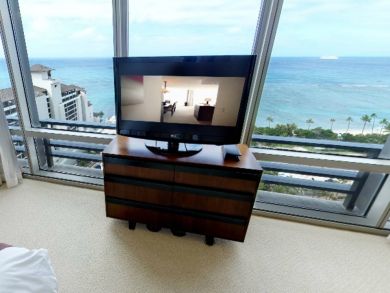 Bedroom with flat screen TV & wonderful ocean view