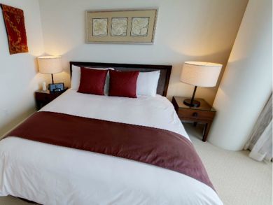 Sample sleeping area with king bed