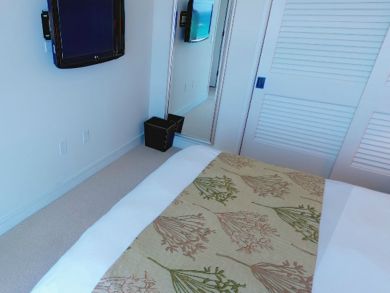 Guest bedroom with flat screen