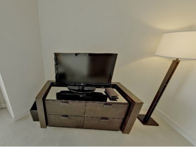 Flat screen TV in master bedroom