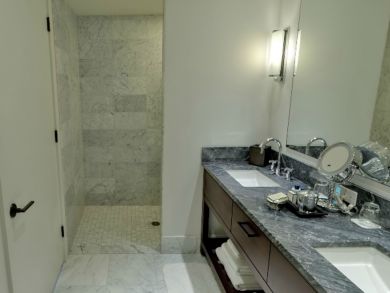 Bathroom with shower & dual vanity