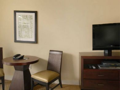 LCD flat screen TV & reading table in bedroom 2