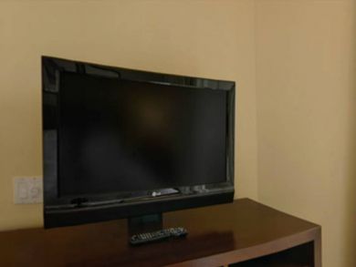 LCD flat screen TV in bedroom 1