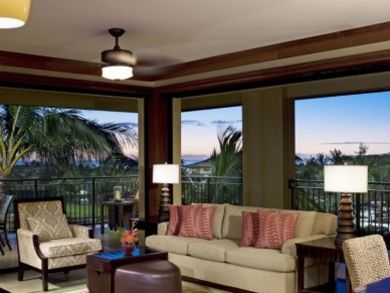 Sample living room with garden & ocean view