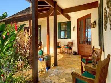 Large porch with sitting & dining areas
