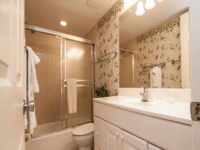 Bathroom with tub and shower