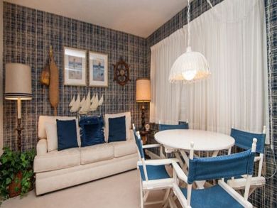 Den with sleeper sofa & table set
