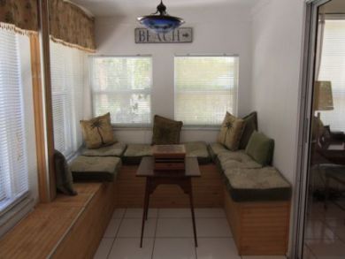 Spacious porch with seating for reading or games
