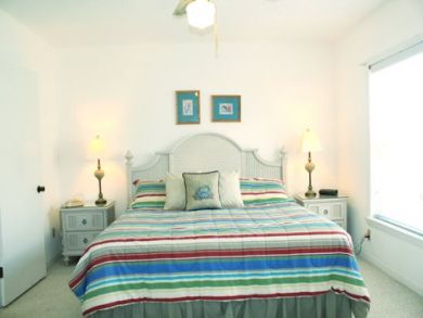 Master bedroom with king bed Master bedroom with king bed