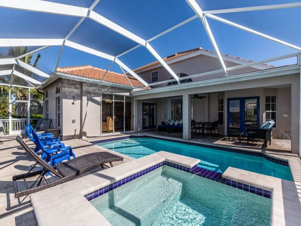 Marco Island Four Bedroom Waterfront Pool Home Walk to Beach