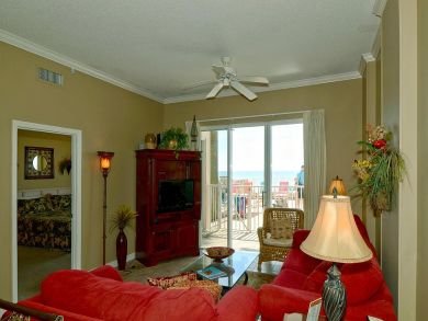 Gulf view living area with flat screen TV