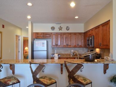 Full kitchen with stainless steel appliances