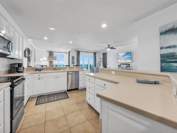 Spacious 5-Bedroom Beachfront Condo with Gulf Views and Luxury Amenities