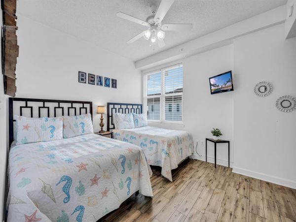 Spacious 5-Bedroom Beachfront Condo with Gulf Views and Luxury Amenities