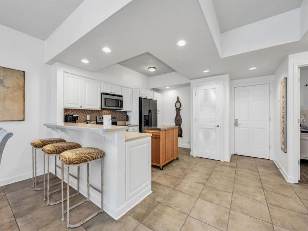 Spacious 5-Bedroom Beachfront Condo with Gulf Views and Luxury Amenities