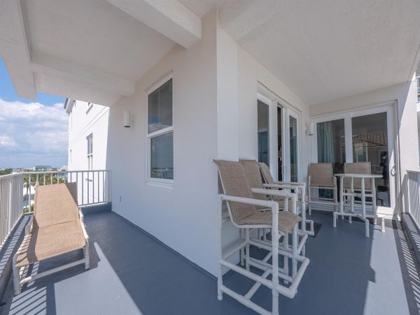 Spacious 5-Bedroom Beachfront Condo with Gulf Views and Luxury Amenities