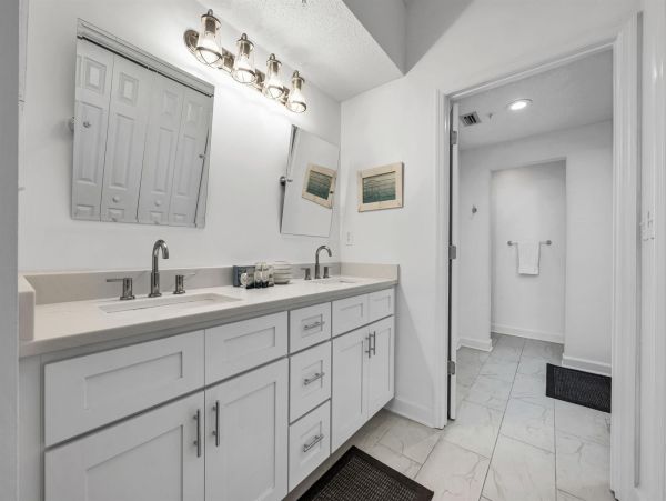 Spacious 5-Bedroom Beachfront Condo with Gulf Views and Luxury Amenities