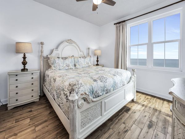 Spacious 5-Bedroom Beachfront Condo with Gulf Views and Luxury Amenities