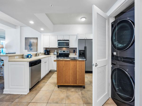 Spacious 5-Bedroom Beachfront Condo with Gulf Views and Luxury Amenities