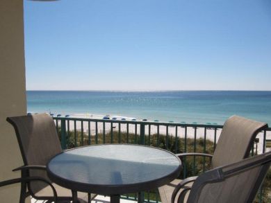 Gulf front balcony with table set Gulf front balcony with table set