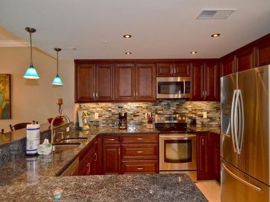 Full kitchen with stainless steel appliances